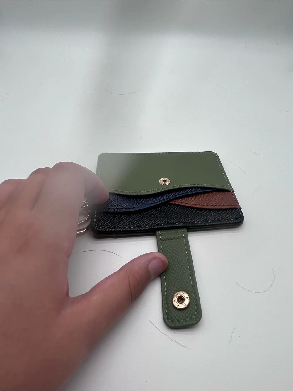 Try colored wallet with wristlet and tassel